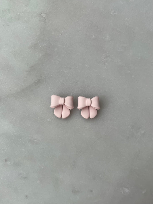 Light pink bow studs