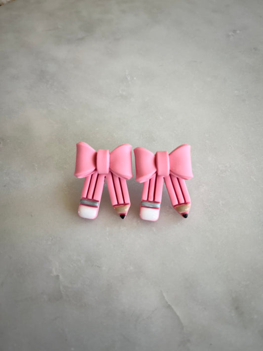 Pink pencil bow studs